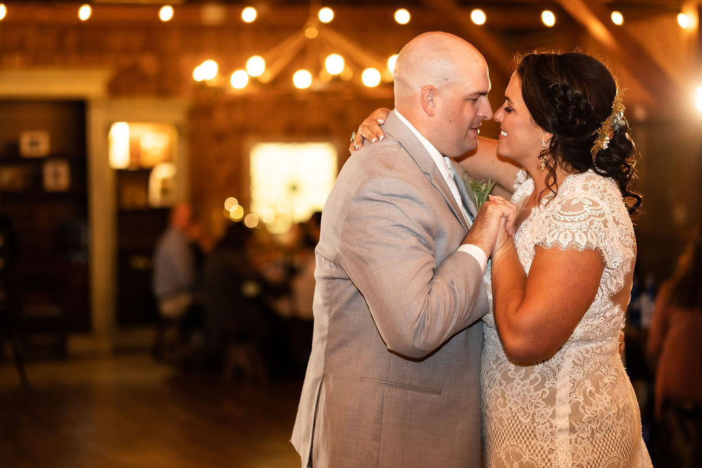 Bride and groom's first dance shot by Maryland wedding photographer, Kimberly Dean at Camp Hidden Valley at Deer Creek Preserve's reception area