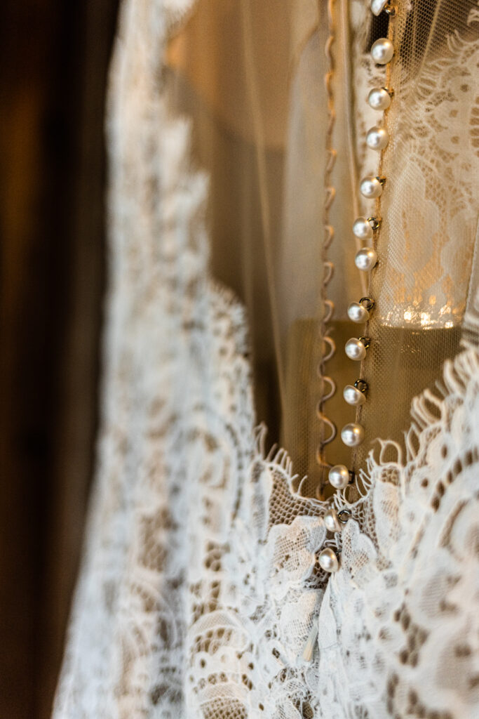 Wedding gown details shot by Maryland wedding photographer, Kimberly Dean at Camp Hidden Valley at Deer Creek Preserve